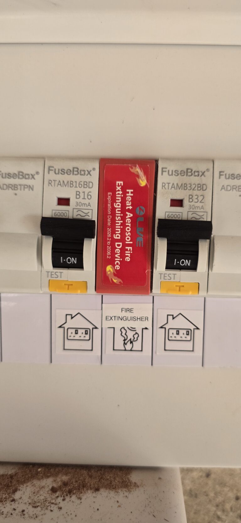 Modern metal consumer unit with RCBOs and DIN rail fire suppression device fitted by NextPhase Energy, electrician Goole, East Yorkshire